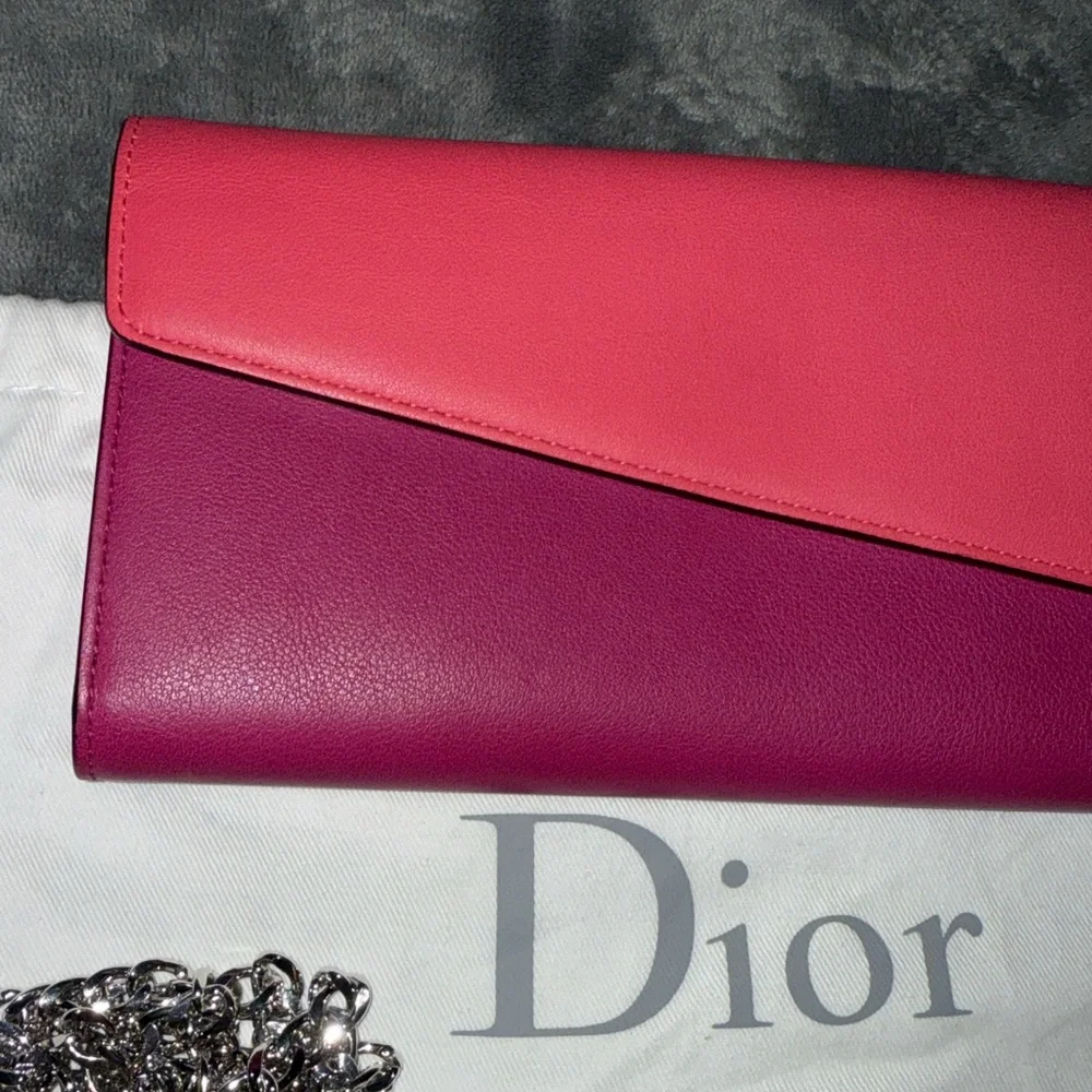 Christian Dior wallet on a chain pink n orange leather excellent condition.